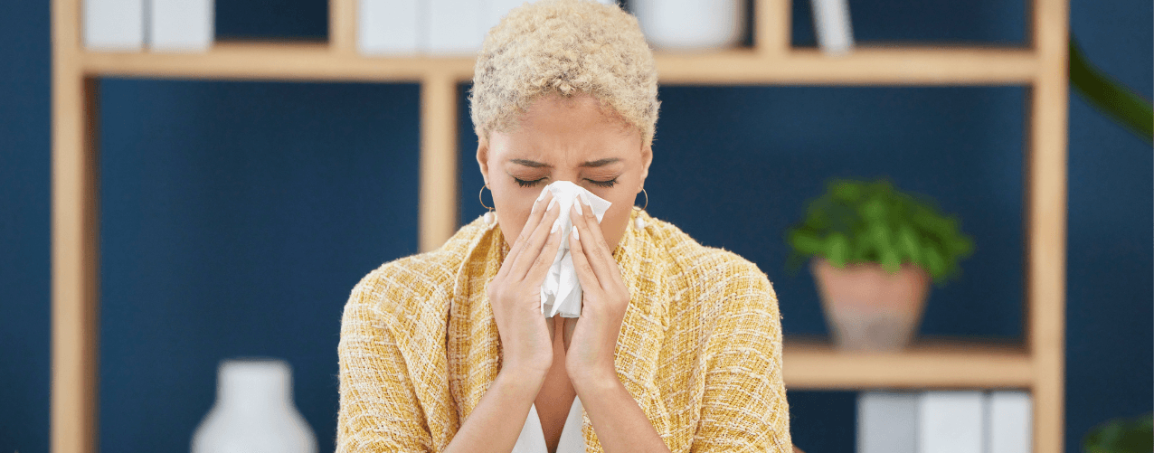 Female blowing nose