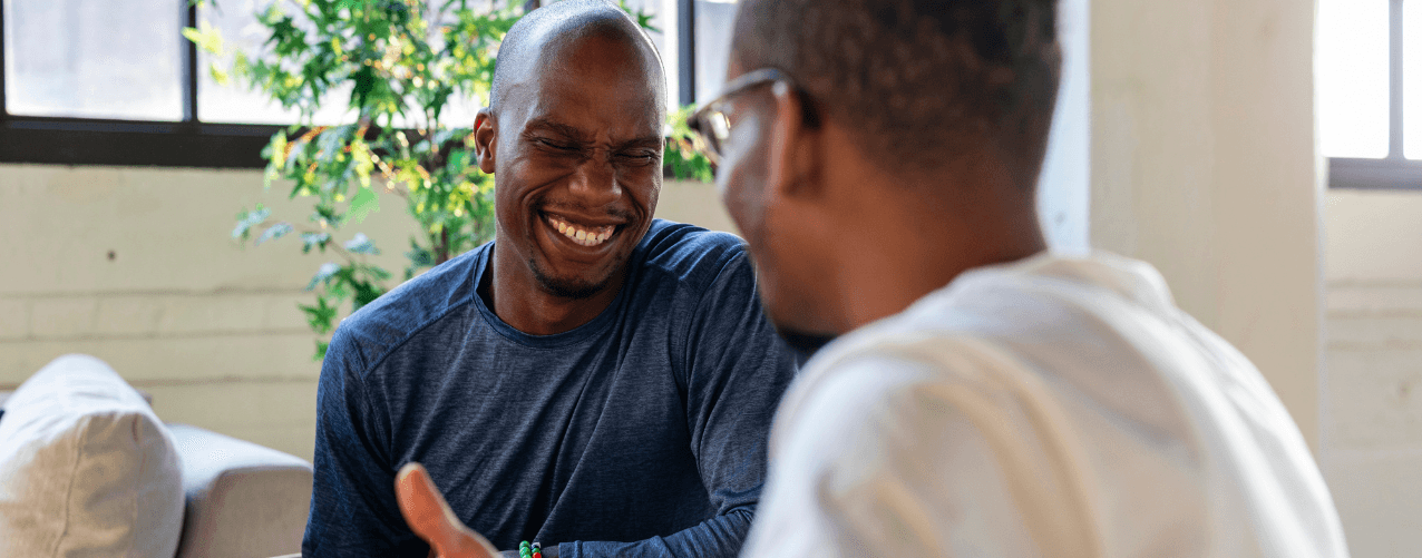 Colleagues smiling and laughing