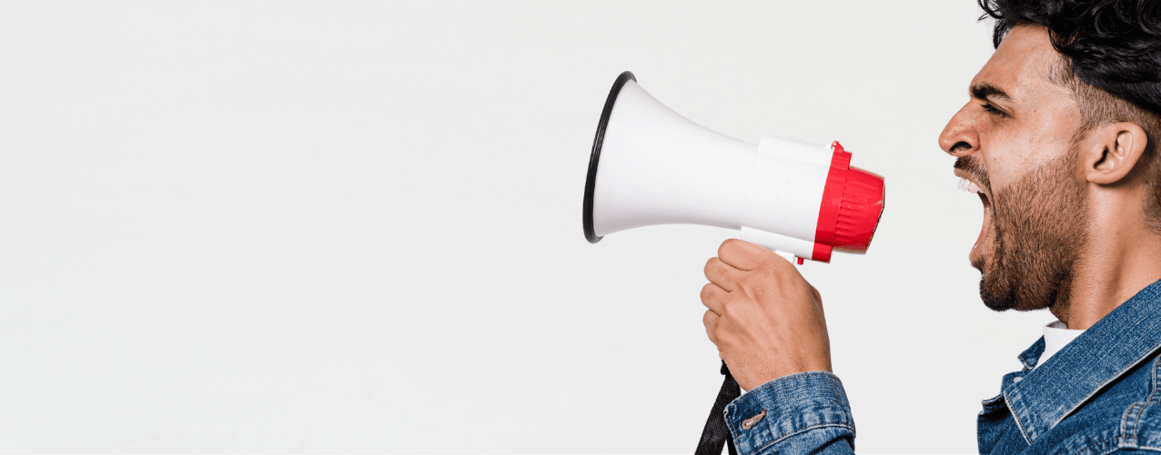 Man shouting into megaphone